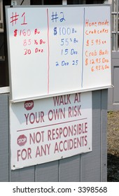 Sign Showing The Price Of Crabs At A Marina Crab Shack