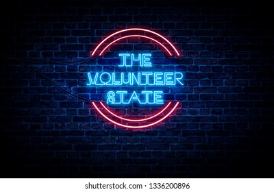 A sign showing Tennessee state slogan, in blue and red neon light on a brick wall background and wires on the side. - Shutterstock ID 1336200896