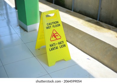 Sign Showing Warning Wet Floor Caution.