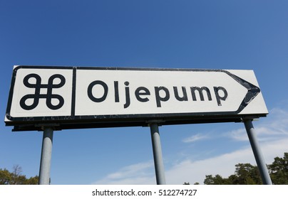 The Sign Shows The Way To The Attraction, Oil Pump In Disused Oil Well In The Swedish Province Of Gotland.