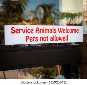 Sign Stating Service Animals Welcome Pets Not Allowed