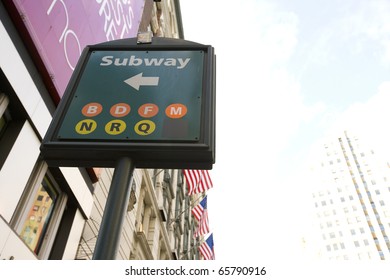 Sign To The Subway At Midtown  In New York City.