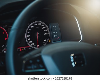 The sign and symbol on car dashboard. Car speedometer closeup. Car interior.