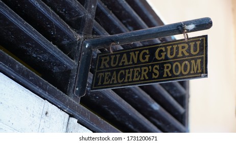 The Sign System In Indonesian Schools. Teacher Room Sign