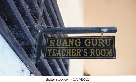 The Sign System In Indonesian Schools. Teacher Room Sign