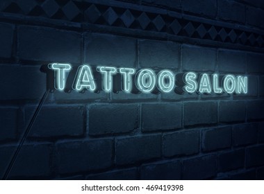 Sign Tattoo Salon on brick wall background