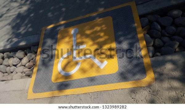 sign that indicates that the place that includes it\
is intended to improve the accessibility of these people or that a\
person with physical disability has the object that carries it for\
example a car.