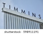 Sign of Timmins, Ontario on top of steel bar