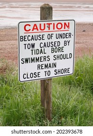 Sign - Undertow Warning For Swimmers.