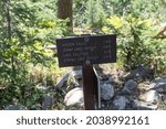Sign for various hiking trails in Grand Teton National Park, for Hidden Falls, Lake Solitude, String Lake