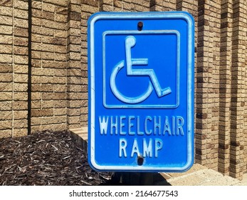 Sign wheelchair ramp. Blue square handicap sign with wheelchair ramp. Sign for support wheelchair disabled people.