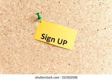 sign up word typed on a paper and pinned to a cork notice board - Shutterstock ID 315502508