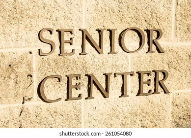 A Sign With The Words Senior Center On It.