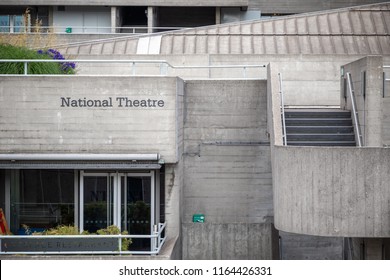The signage and Brutalist architecture of the National Theatre in the South Bank area, London
