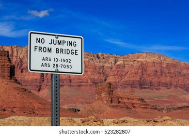 Signage with jumping restrictions on a foot bridge, Arizona, US - Shutterstock ID 523282807