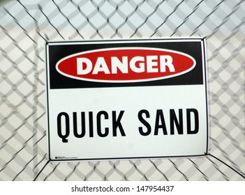 Signage Warning Against Quick Sand In Development Area