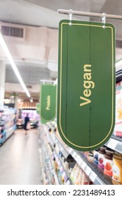 Signage word of Vegan food in supermarket grocery aisle