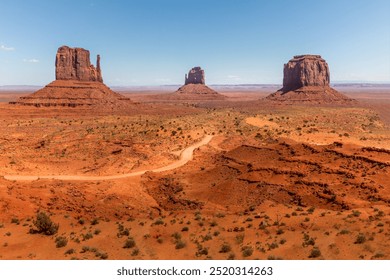 Signature view over the monuments in the Monument Valley, Arizona USA - Powered by Shutterstock