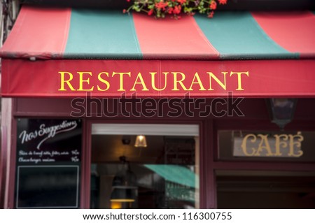 Signboard by entrance in restaurant. Paris. France