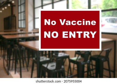 Signboard, No Vaccine, No Entry At An Indoor Restaurant.