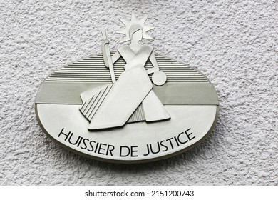 Signboard on a building of the bailiff called huissier de justice in French language