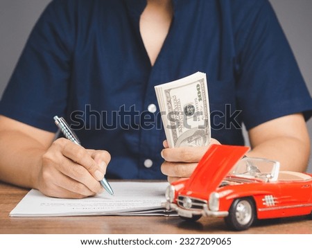 Signing the car loan agreement. Get a car loan with repayment options and a legal contract. Unlock your vehicle financing options. Get a title loan for quick cash and no hassle borrowing