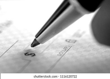 Signing A Check For Personal Finances