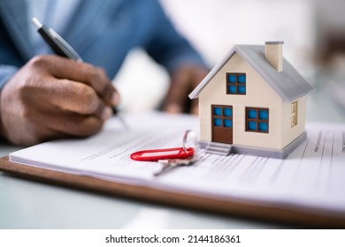 Signing House Rental Contract Document And Property Lending