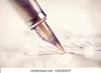 Signing A Signature With A  Pen
