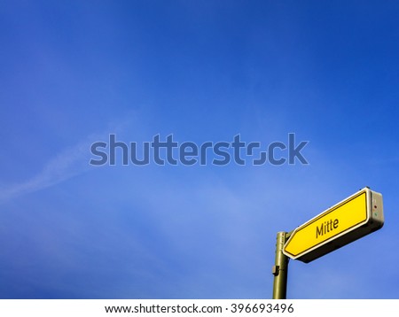 signpost and blue sky