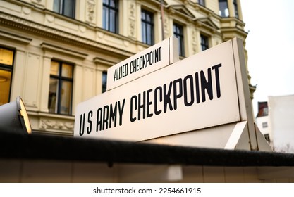 Signpost at Checkpoint Charlie. The crossing point between East and west Berlin, symbol of the Cold War.