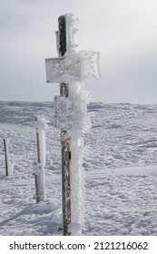 Signpost In Icy Conditions On The Mountain Honeck In The Vosges In France