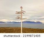 Signpost at Pond Inlet on Eclipse Sound, Baffin Island, Nunavut, Canada.