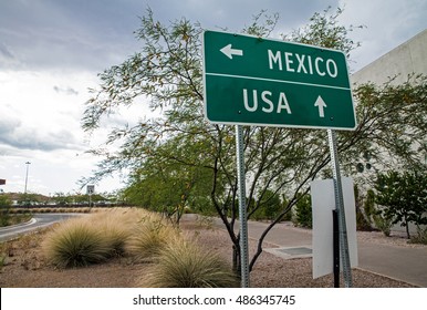 Signpost at the US-Mexican border - Shutterstock ID 486345745