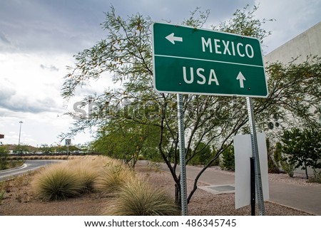 Signpost at the US-Mexican border