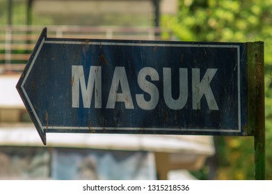 Signpost Writing Masuk Entrance English Used Stock Photo Edit Now