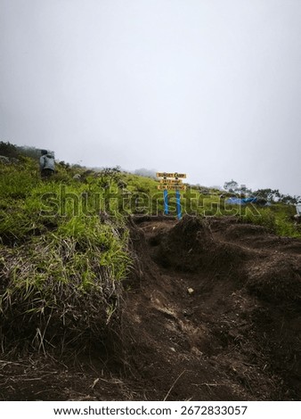 Signposts are very important when climbing on a mountain.