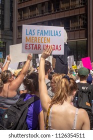 Signs And Crowd At Families Belong Together - Chicago March, JUNE 30, 2018, Richard J Daley Center, Chicago, IL