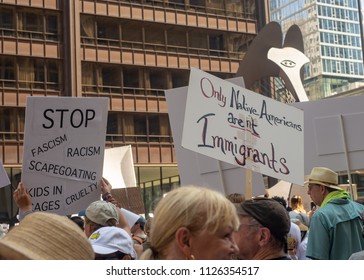 Signs And Crowd At Families Belong Together - Chicago March, JUNE 30, 2018, Richard J Daley Center, Chicago, IL