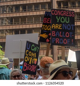 Signs And Crowd At Families Belong Together - Chicago March, JUNE 30, 2018, Richard J Daley Center, Chicago, IL