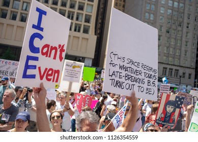 Signs And Crowd At Families Belong Together - Chicago March, JUNE 30, 2018, Richard J Daley Center, Chicago, IL