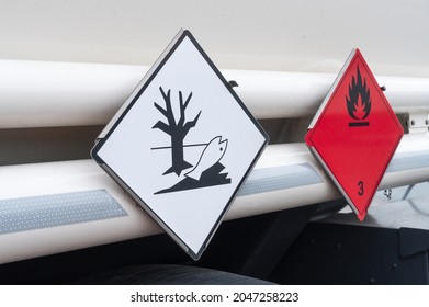 Signs for the dangerous goods classes , here for environmentally hazardous and flammable liquid substances - Shutterstock ID 2047258223