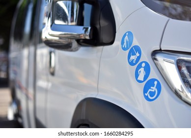 Signs elderly, pets, pregnant and disabled on shuttle minibus - Powered by Shutterstock