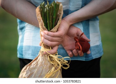 Signs of engagement, ring and flowers - Powered by Shutterstock