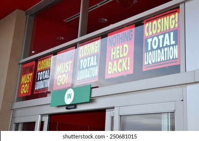 Signs In Front Of Closing Store