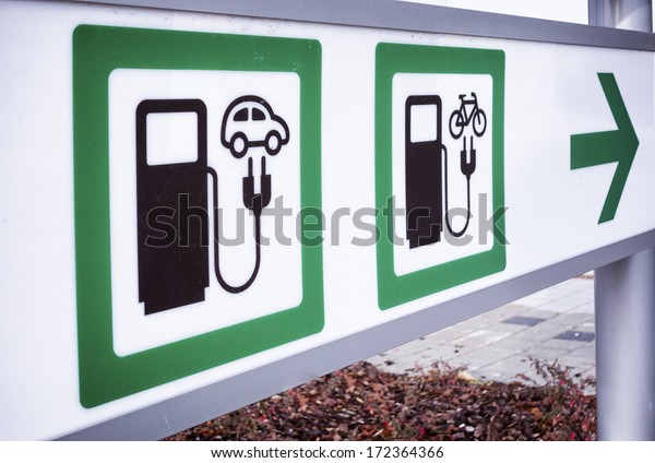 signs for\
a power supply for electric bikes and\
cars