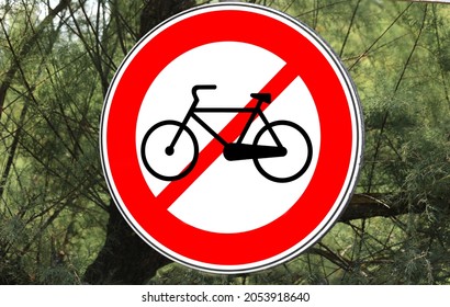 signs prohibiting the circulation of bicycles in an area where only people can walk and not even cars - Shutterstock ID 2053918640