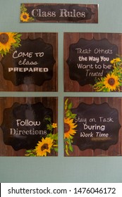 Signs Showing Classroom Rules On A Bulletin Board