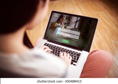 Signup Screen With Blonde Girl And Pad Against Asian Woman Using Laptop With Copy Space