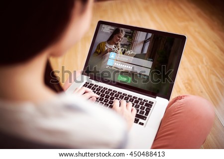 signup screen with blonde girl and pad against asian woman using laptop with copy space